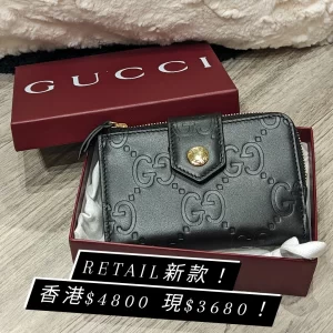 Gucci Logo Debossed Leather Wallet